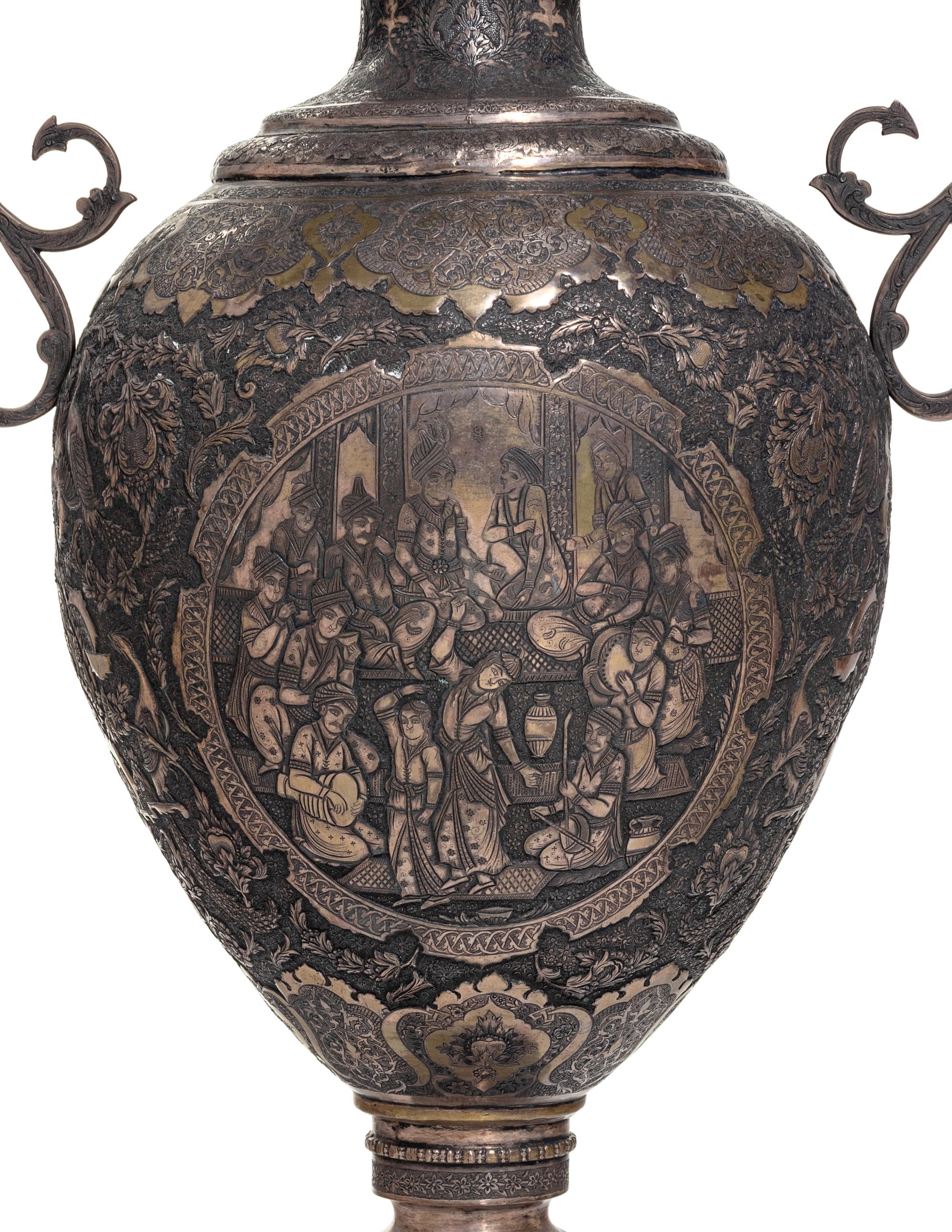 A Pair of Persian Silvered Copper Vases