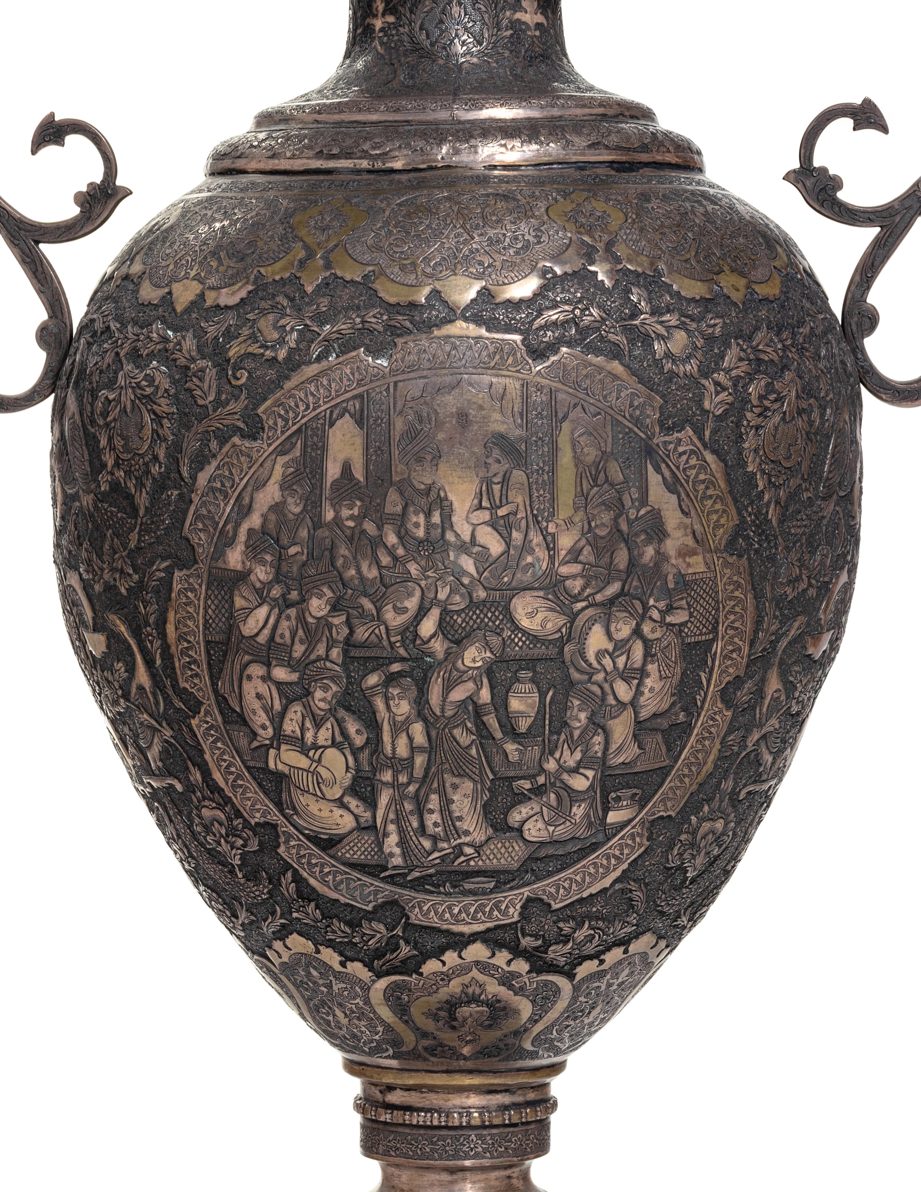 A Pair of Persian Silvered Copper Vases