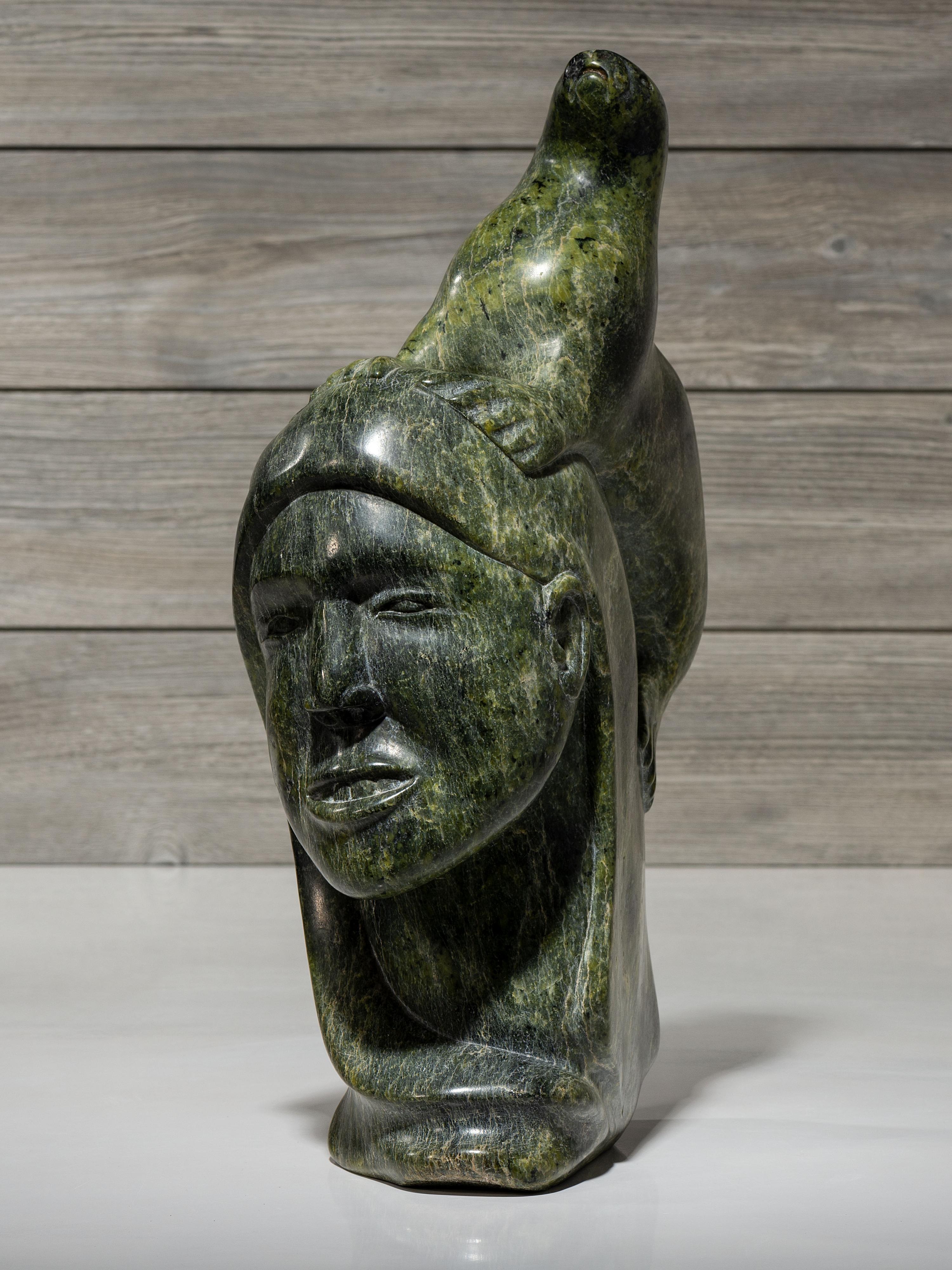 stone sculpture, woman and seal