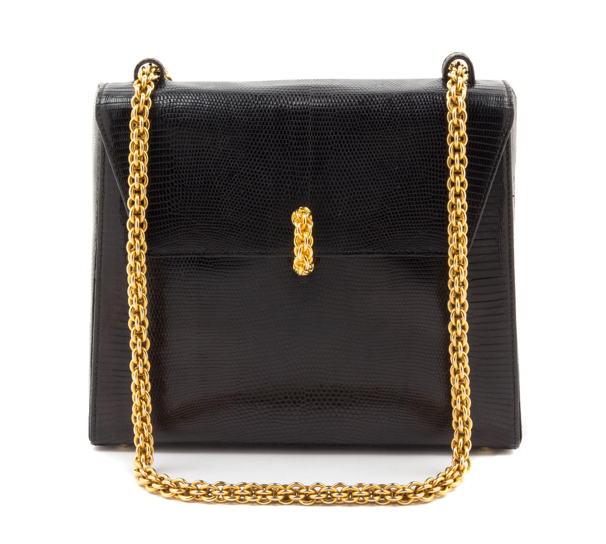 A Paloma Picasso Black Skin Handbag, 10" x 9" x 2.5".