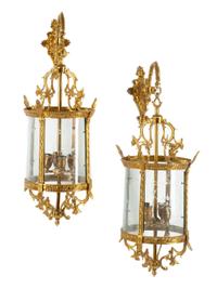 A Pair of English Gilt Bronze and Etched Glass Wall Lanterns Height 31 inches.