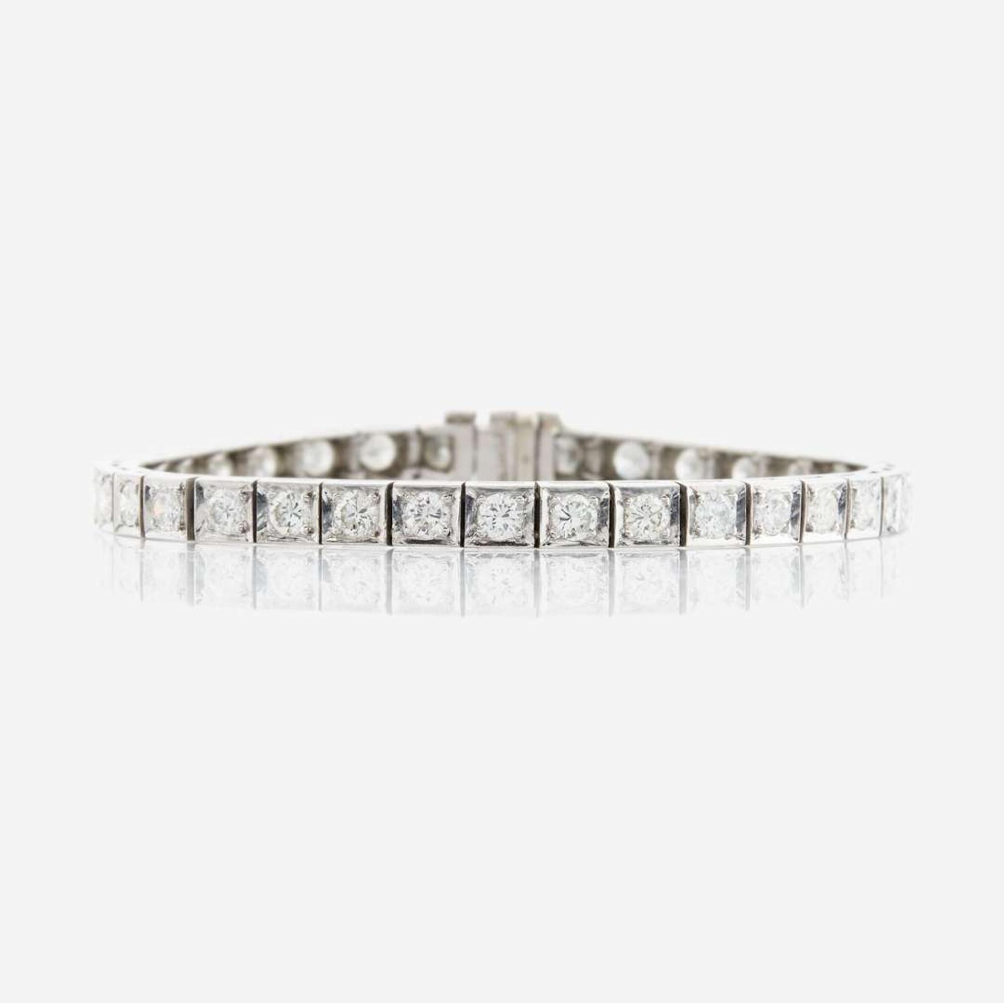 A diamond and platinum line bracelet