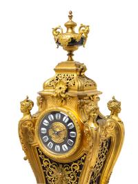 A Louis XV Style Gilt Bronze Mantel Clock