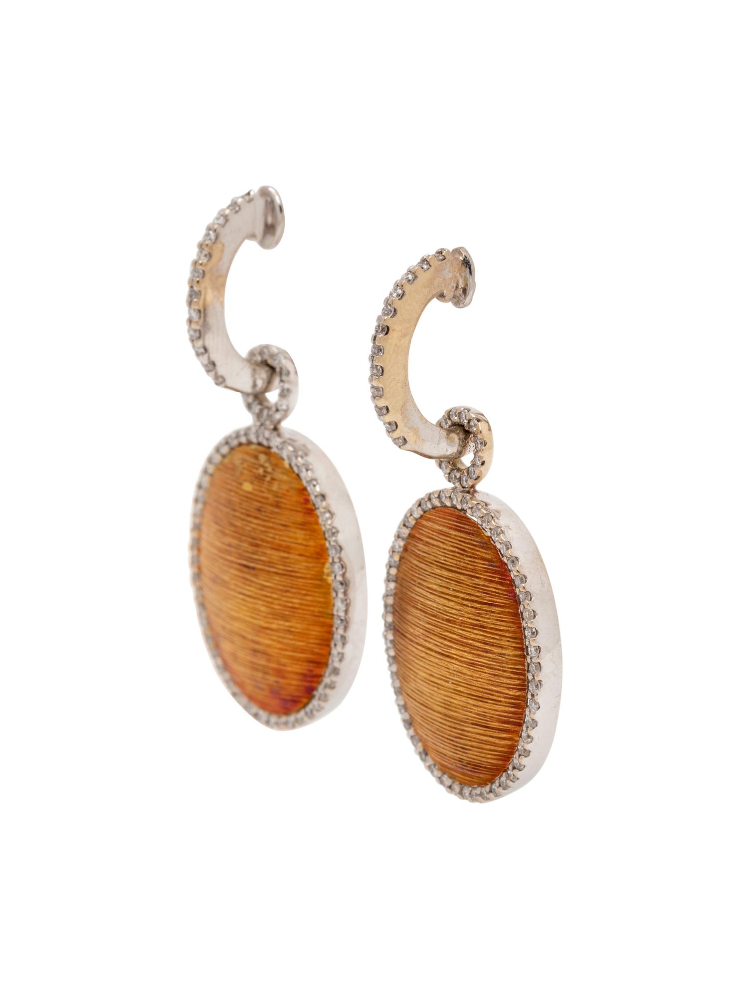 BICOLOR GOLD AND DIAMOND EARCLIPS
