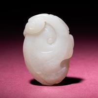 A Small Chinese Russet and Jade 'Bat and Lingzhi' Carving, 18th/19th Century — 清中期 白玉留皮靈芝福壽佩