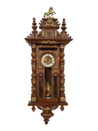 An Austrian Carved Oak Regulator Clock