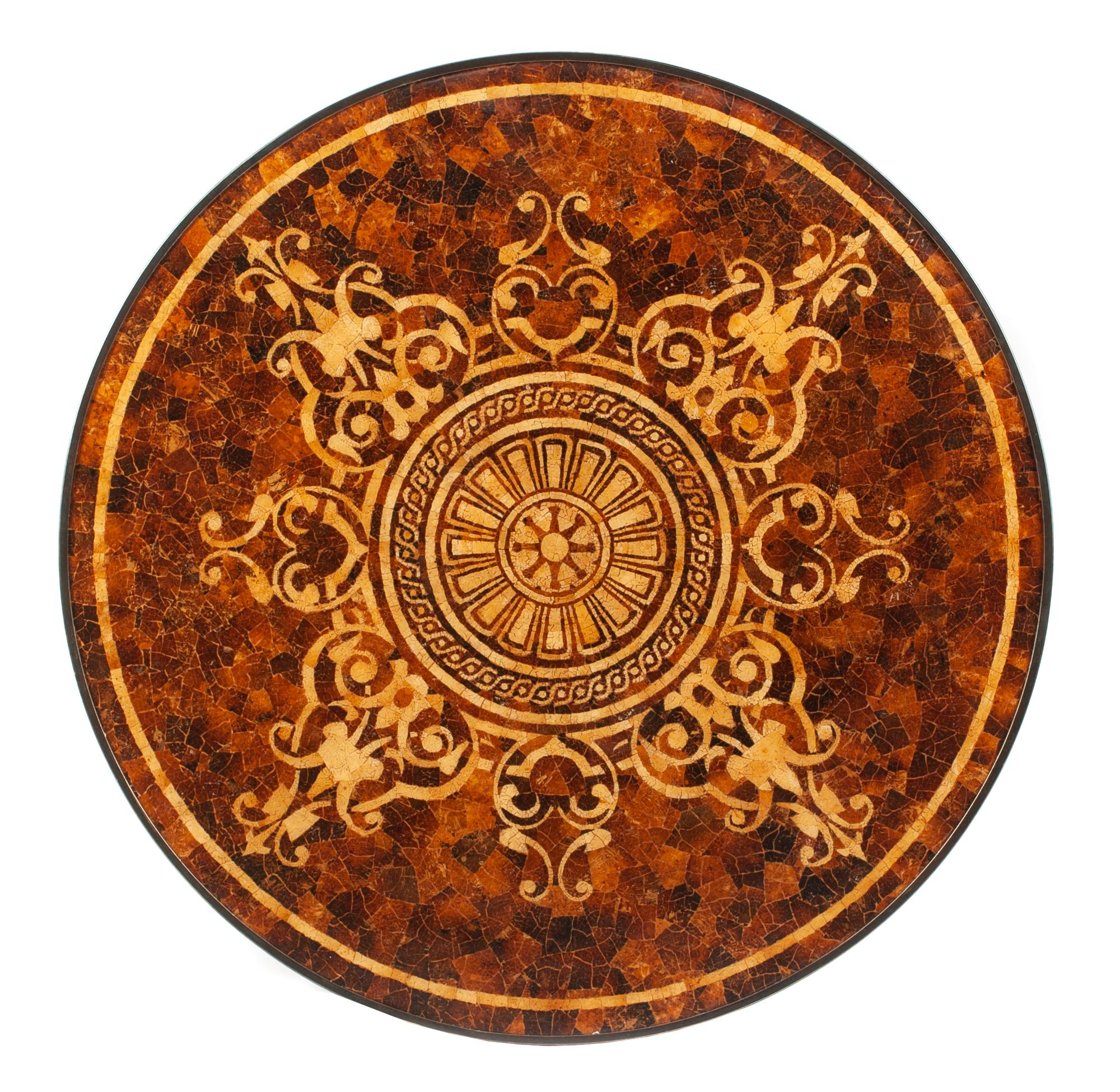 An Empire Style Patinated Bronze Table Height 29 x diameter of top 36 inches.