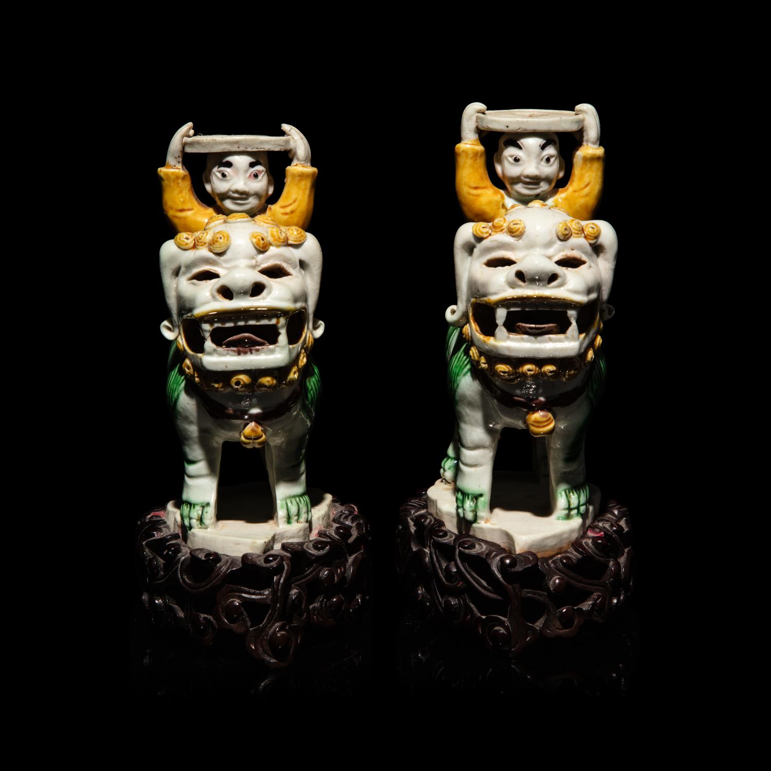 A Pair of Small Chinese Enameled Figures on Lions
