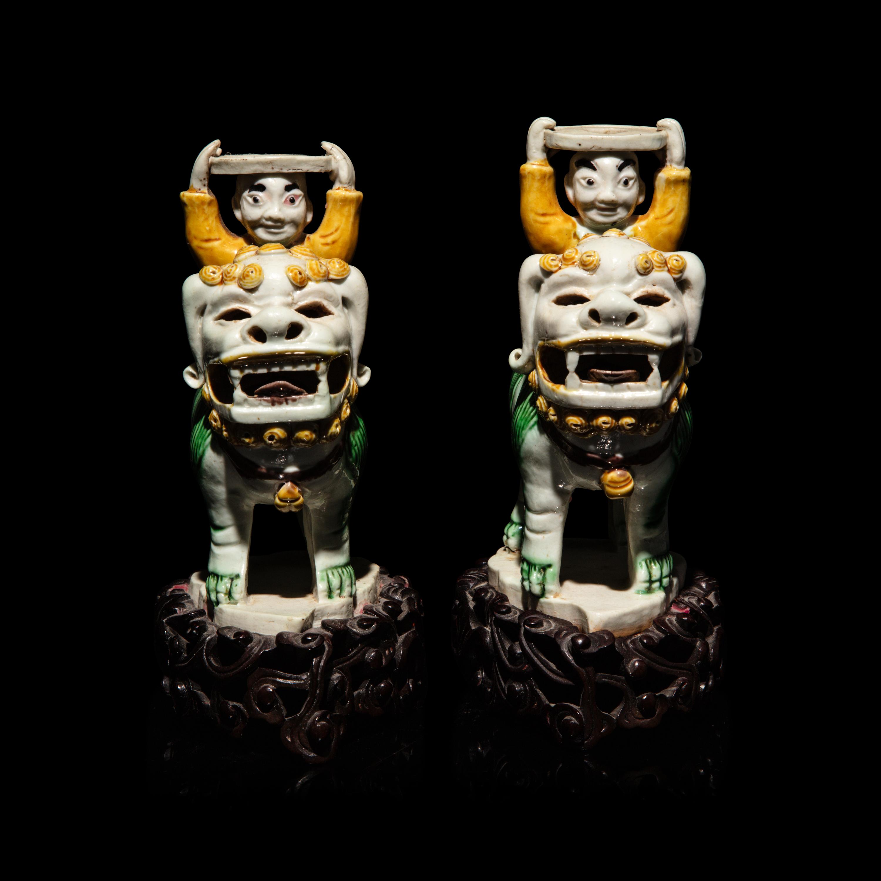 A Pair of Small Chinese Enameled Figures on Lions