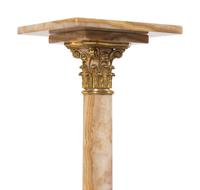A Pair of French Gilt Bronze Mounted Onyx Pedestals