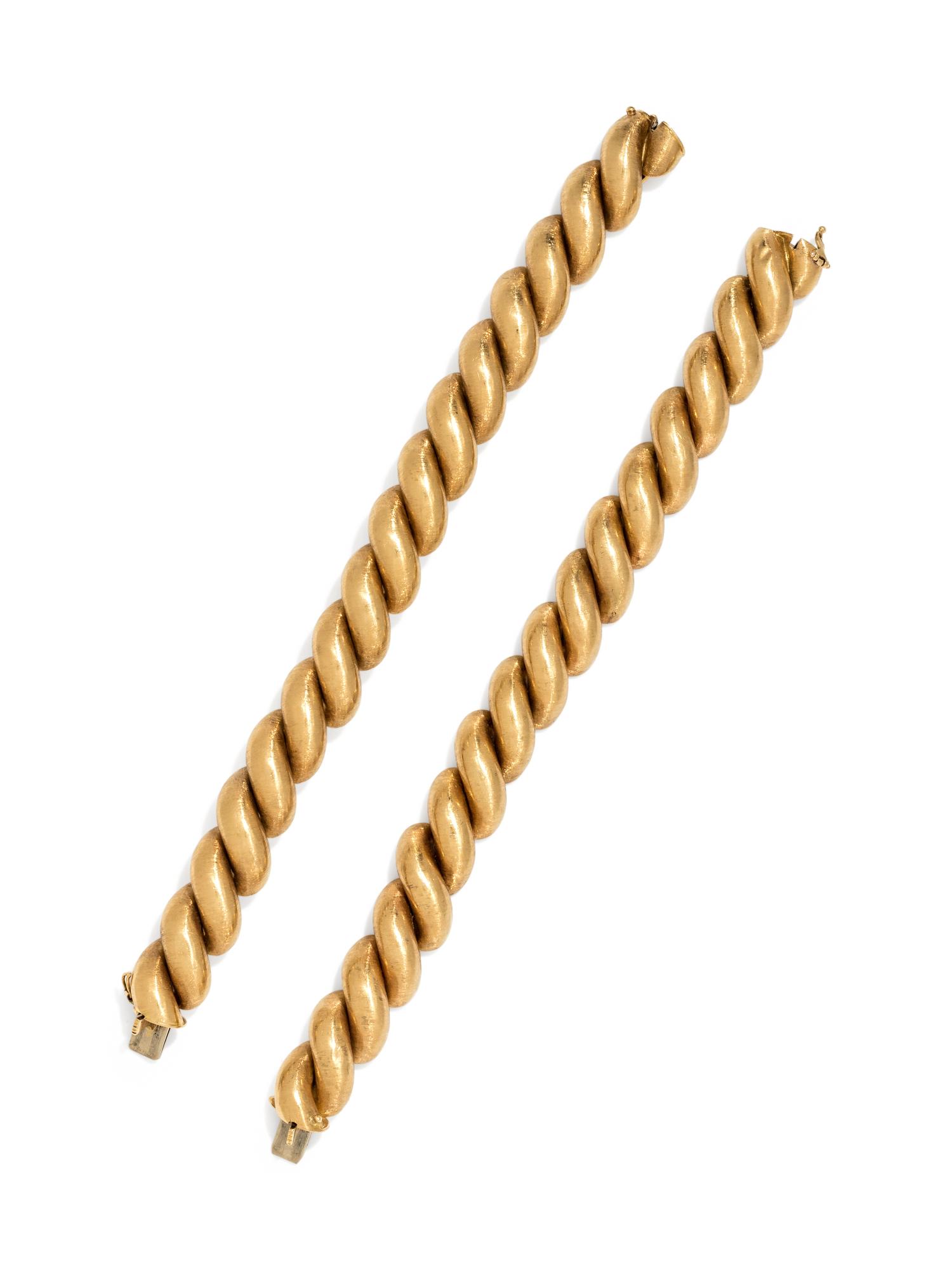 PAIR OF YELLOW GOLD BRACELETS