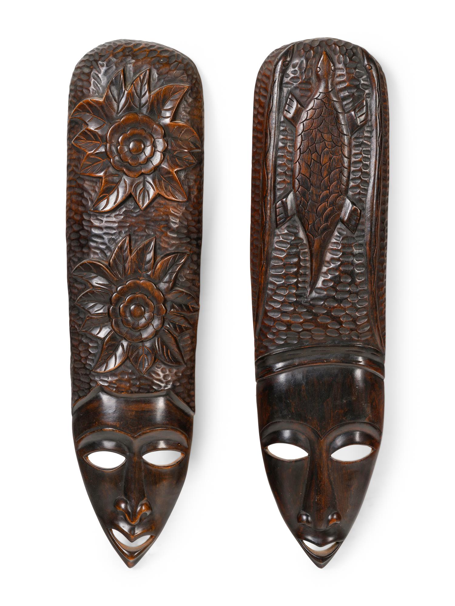 A Pair of African Carved Wood Masks