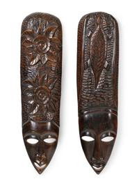 A Pair of African Carved Wood Masks
