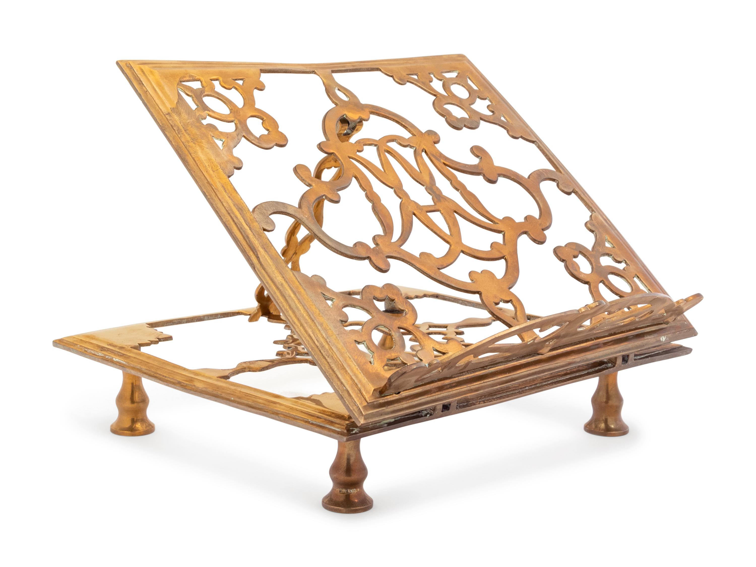 A Continental Brass Book Stand