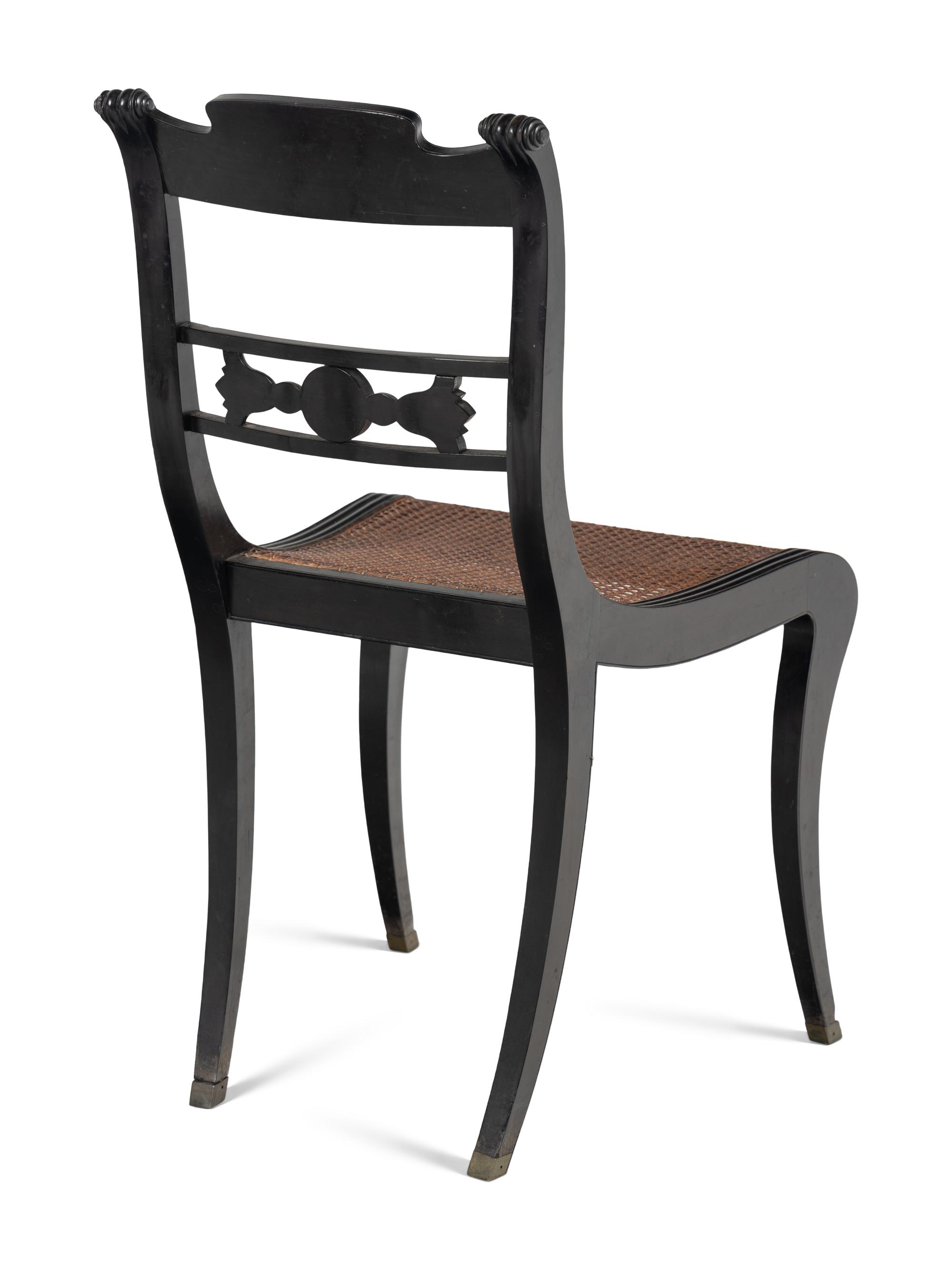 A Set of Four Regency Shell Carved Ebony Side Chairs