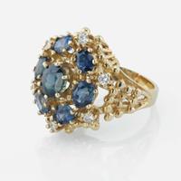 A 14K yellow gold, sapphire, and diamond ring