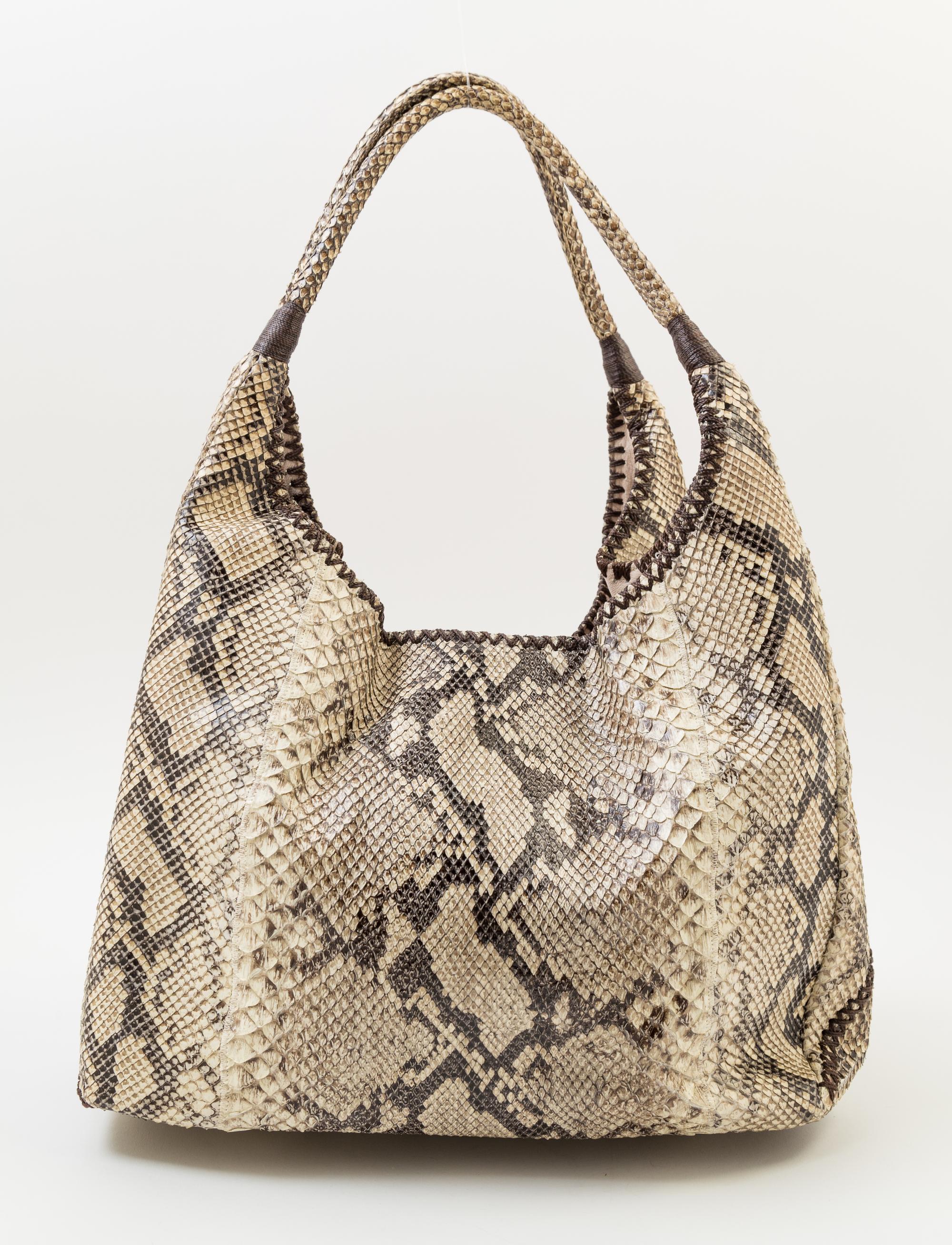 A Carlos Falchi Snakeskin Shoulder Bag, 13" x 11.5" x 7"; Strap drop: 11".