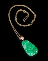 An 18 Karat Gold, Diamond and Jadeite Pendant Height of jadeite 1 1/8 inches.
