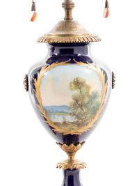 A Pair of Sèvres Style Porcelain Urns Mounted as Lamps