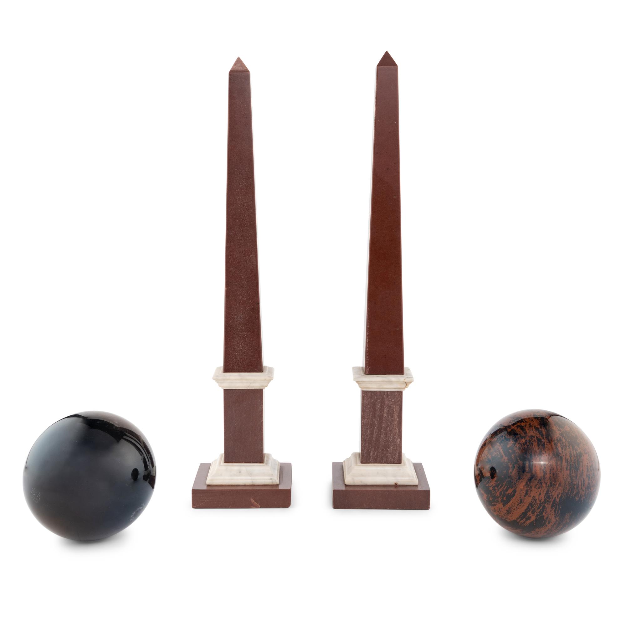 A Pair of Hardstone Obelisks and a Pair of Hardstone Spherical Ornaments
