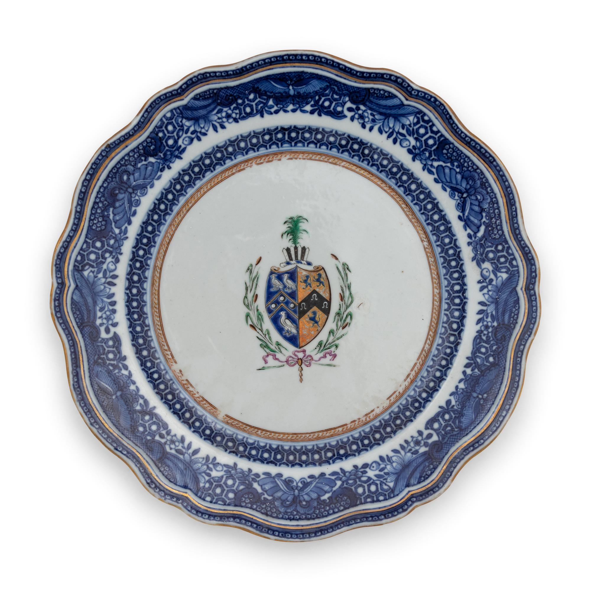 Seven Chinese Export Armorial Porcelain Plates