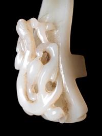 Two Chinese Celadon and Russet Jade Articles