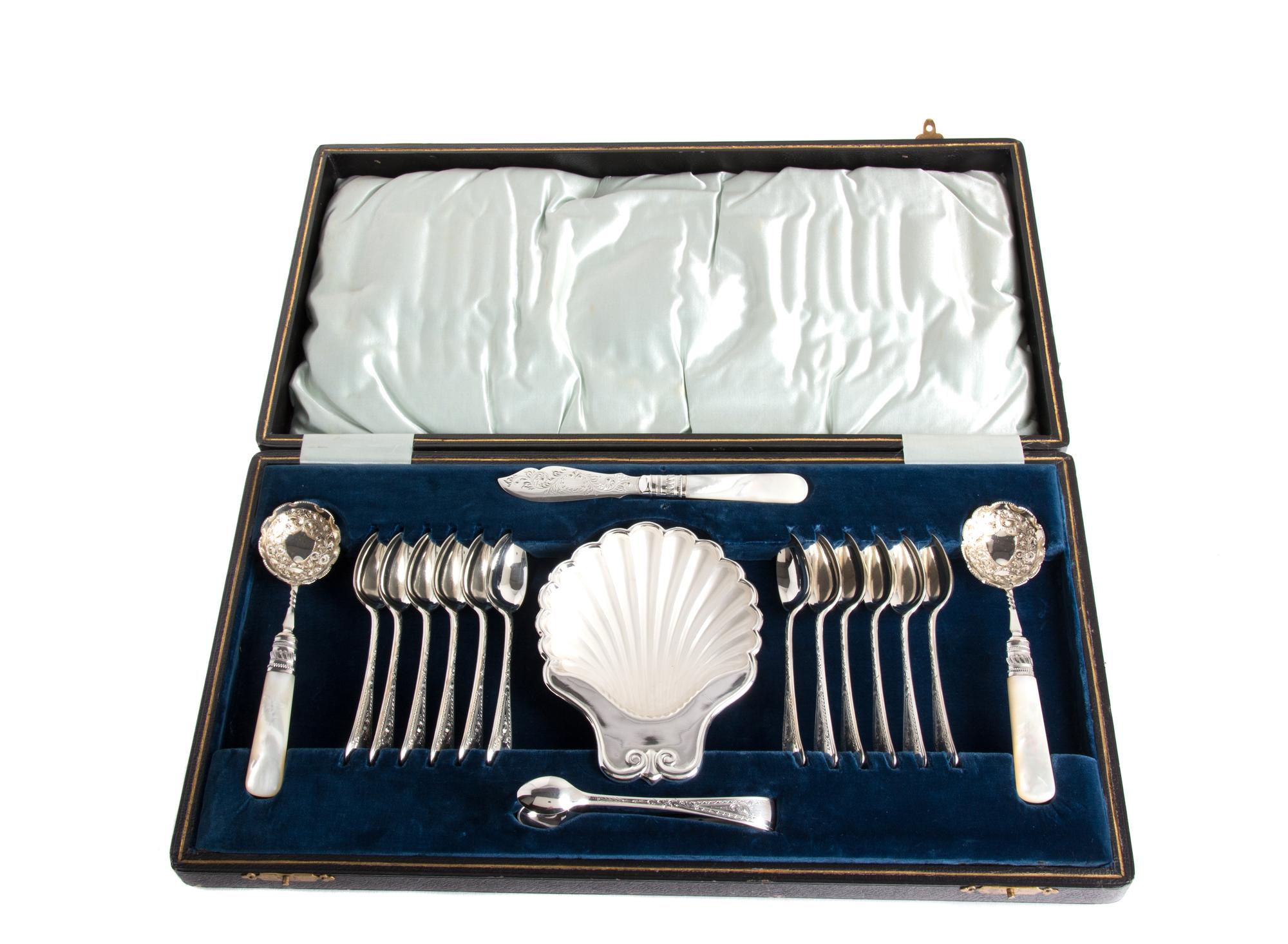 An English Silver Plate and Mother-of-Pearl Handled Dessert Set Length of largest spoon 6 inches. — Joseph Elliot & Sons, Sheffield