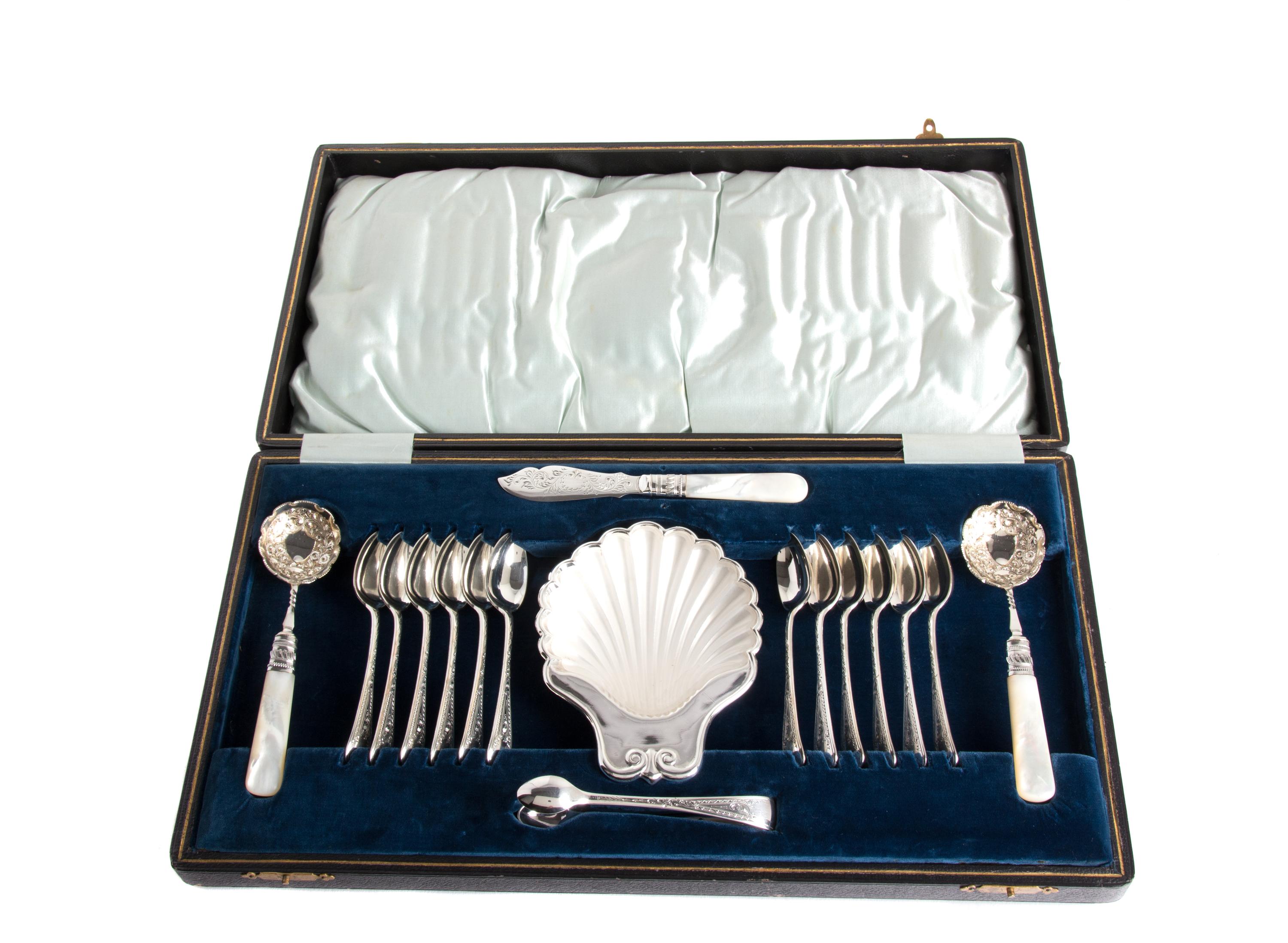 An English Silver Plate and Mother-of-Pearl Handled Dessert Set Length of largest spoon 6 inches. — Joseph Elliot & Sons, Sheffield