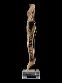 A Cycladic Marble Reclining Female Figure
