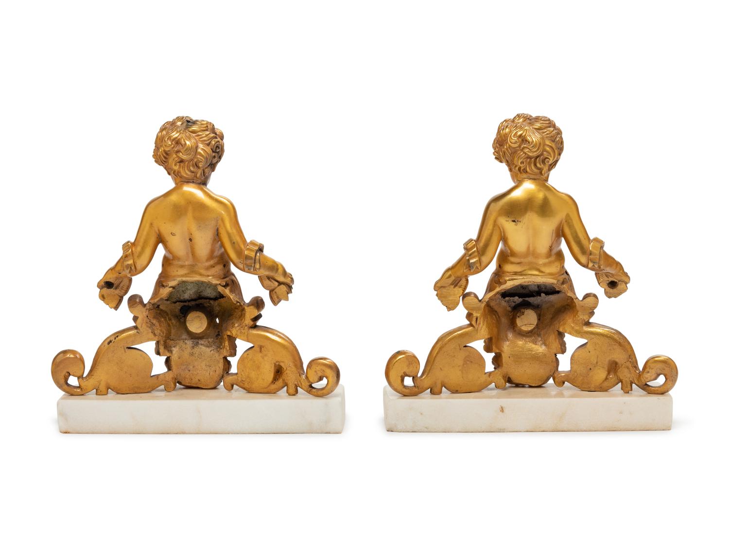 A Pair of Louis XV Gilt Bronze Figural Bookends