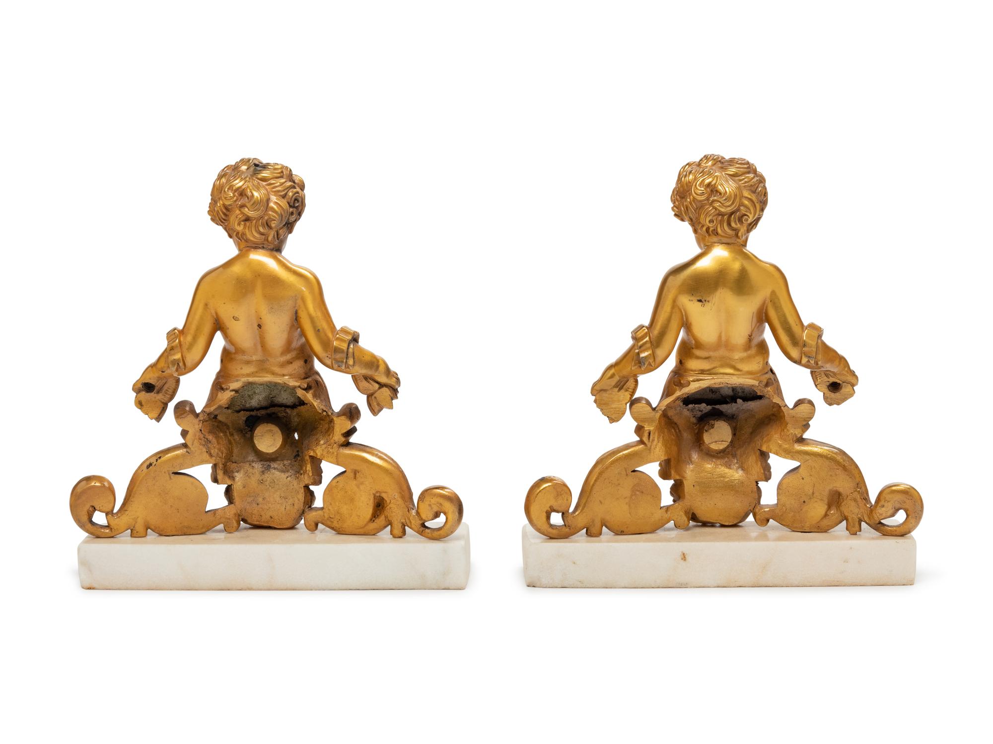 A Pair of Louis XV Gilt Bronze Figural Bookends