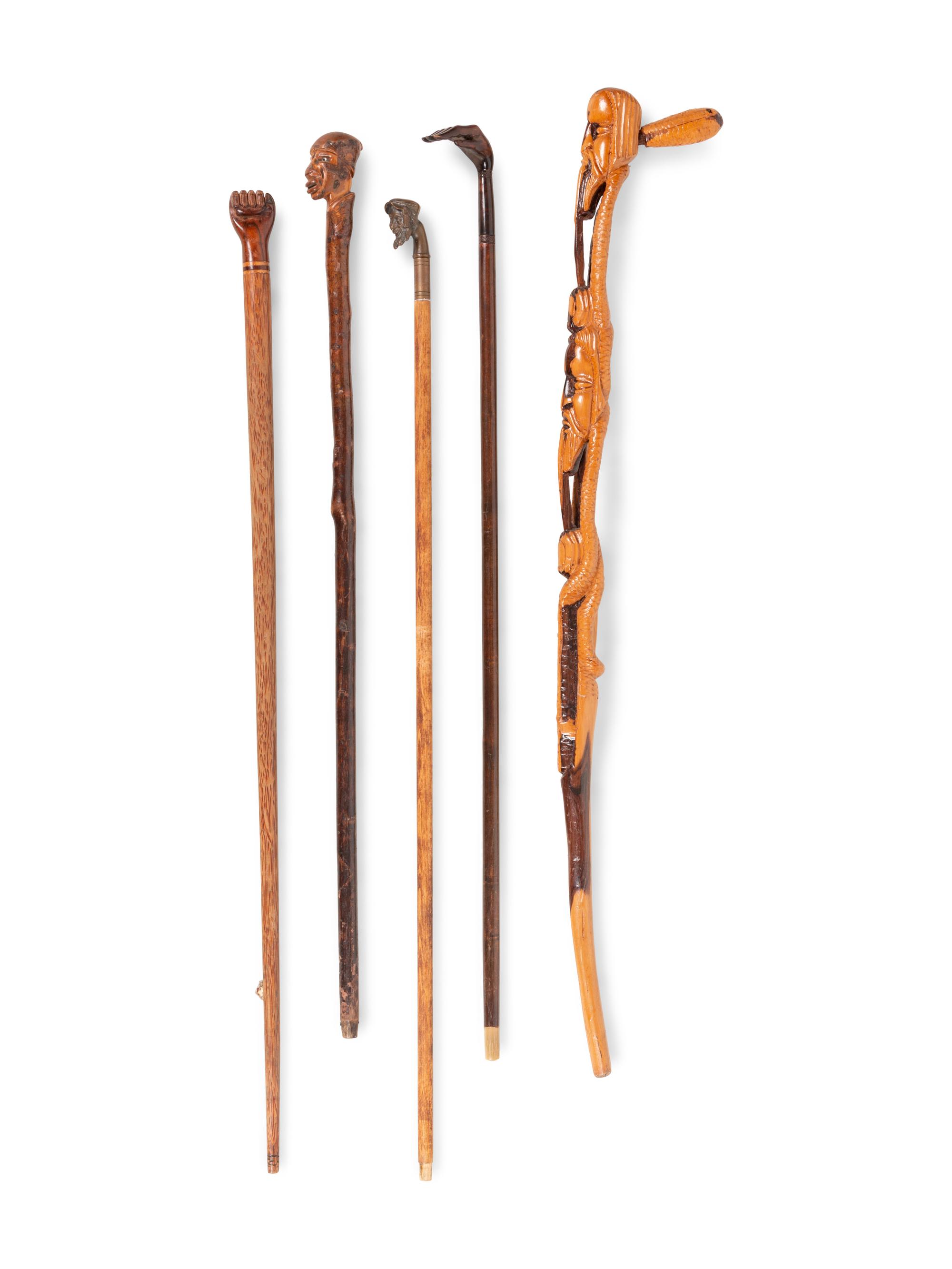 Five Carved and Mixed Metal Figural Canes and Walking Sticks