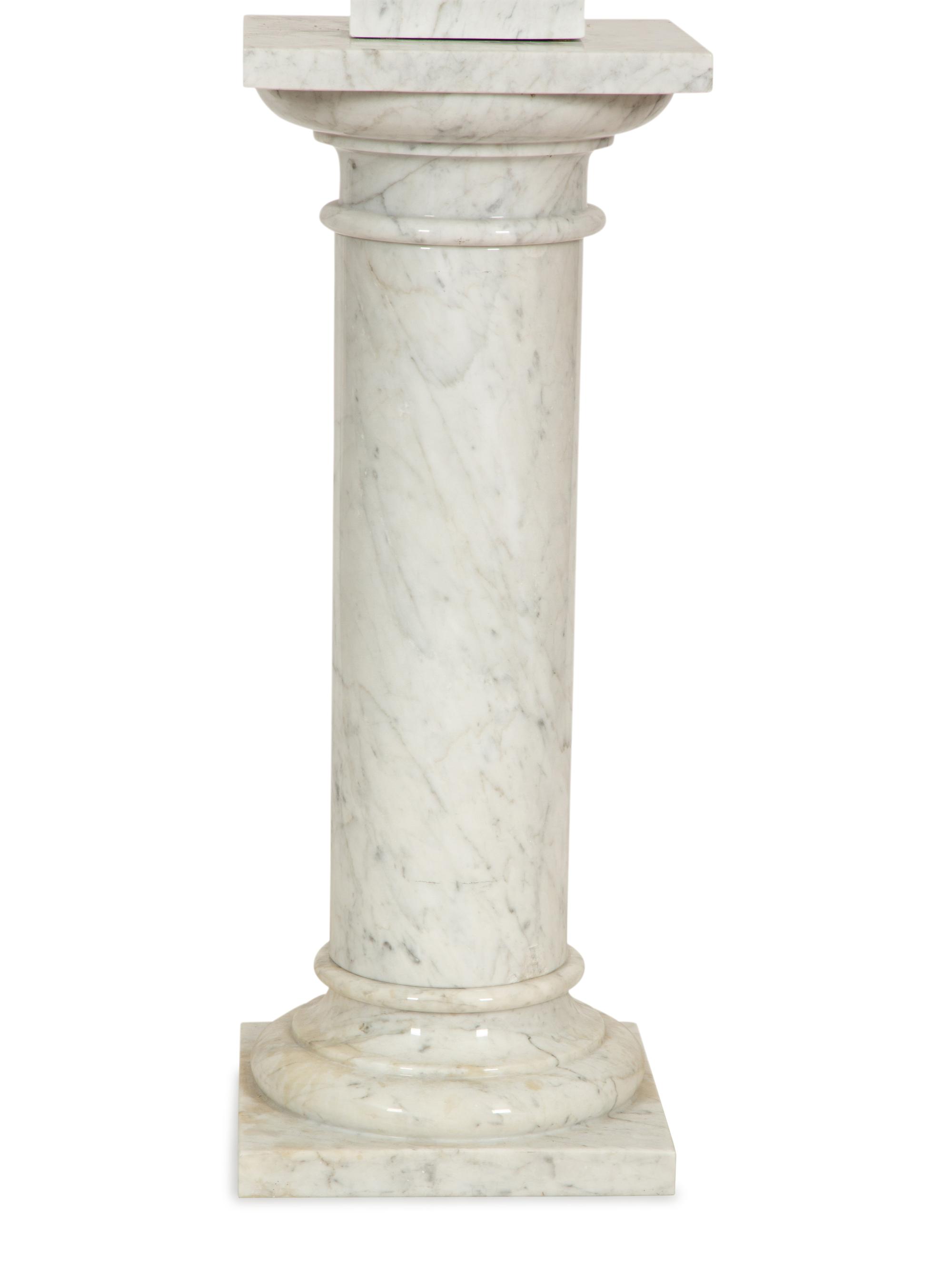 A Pair of White Marble Urns on Matching Pedestals