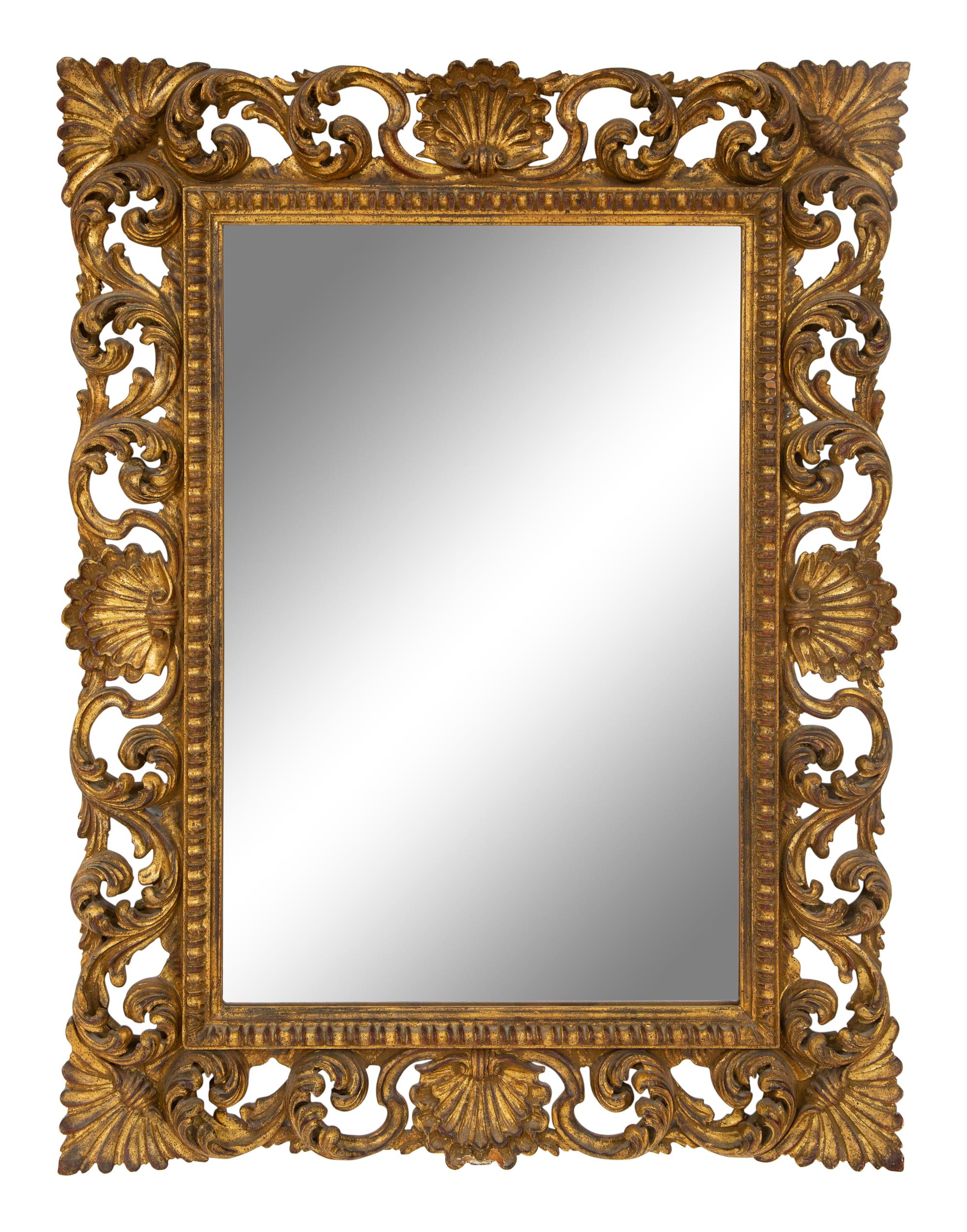 A Louis XV Style Carved Giltwood Mirror