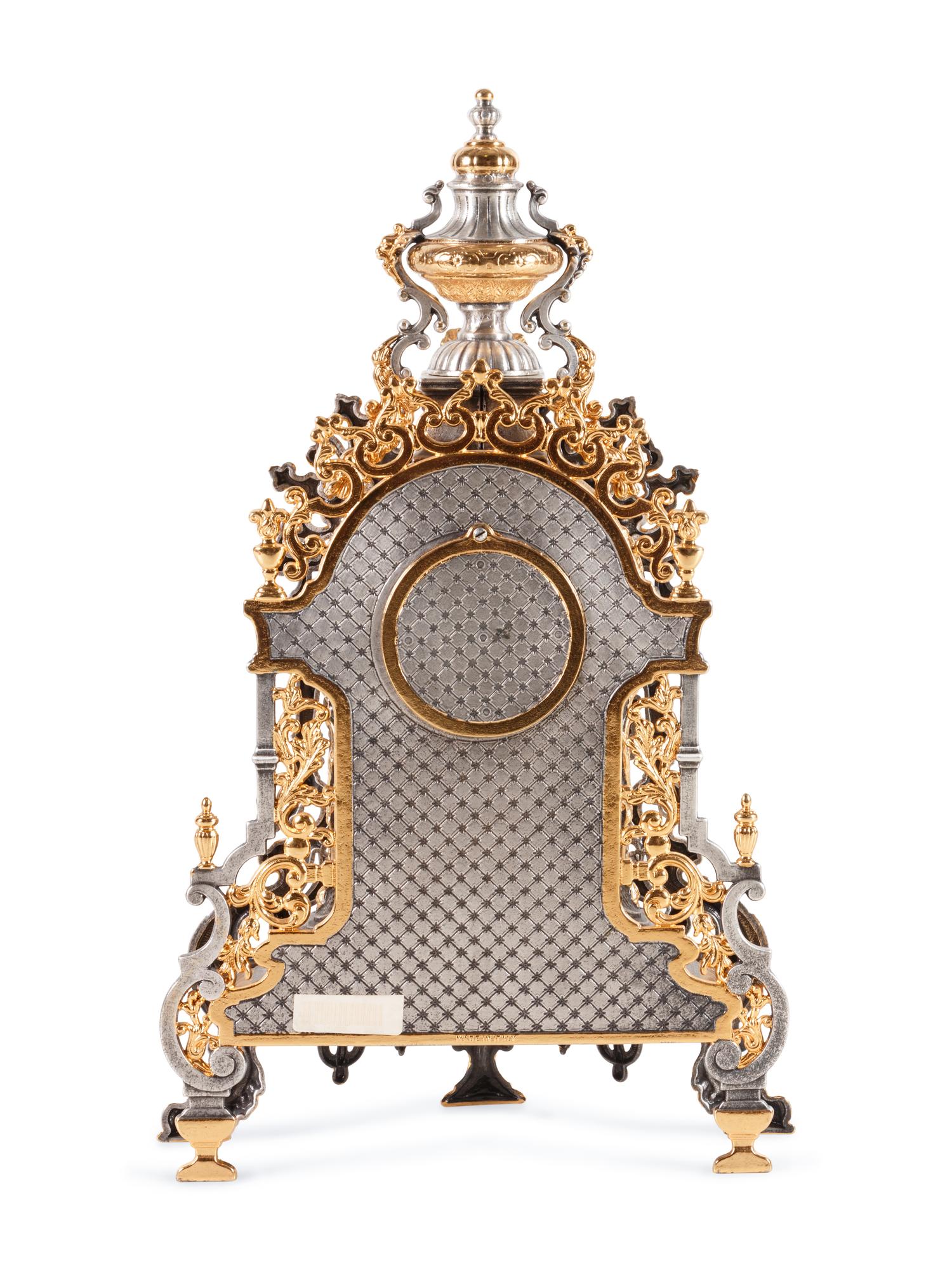 An Italian Gilt and Silvered Metal Mantel Clock