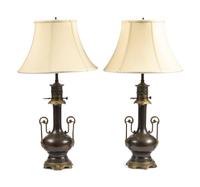 A Pair of French Gilt and Patinated Cast Metal Table Lamps