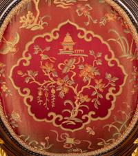 A Pair of Louis XVI Style Stained and Gilt Mahogany Side Chairs.