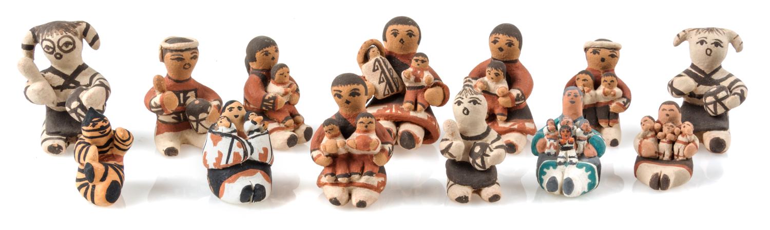 Thirteen Pottery Figures Height of tallest 1 3/8 inches. — Carol Pecos, Jemez, NM