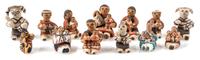 Thirteen Pottery Figures Height of tallest 1 3/8 inches. — Carol Pecos, Jemez, NM