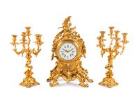 A Louis XV Style Gilt Bronze Clock Garniture