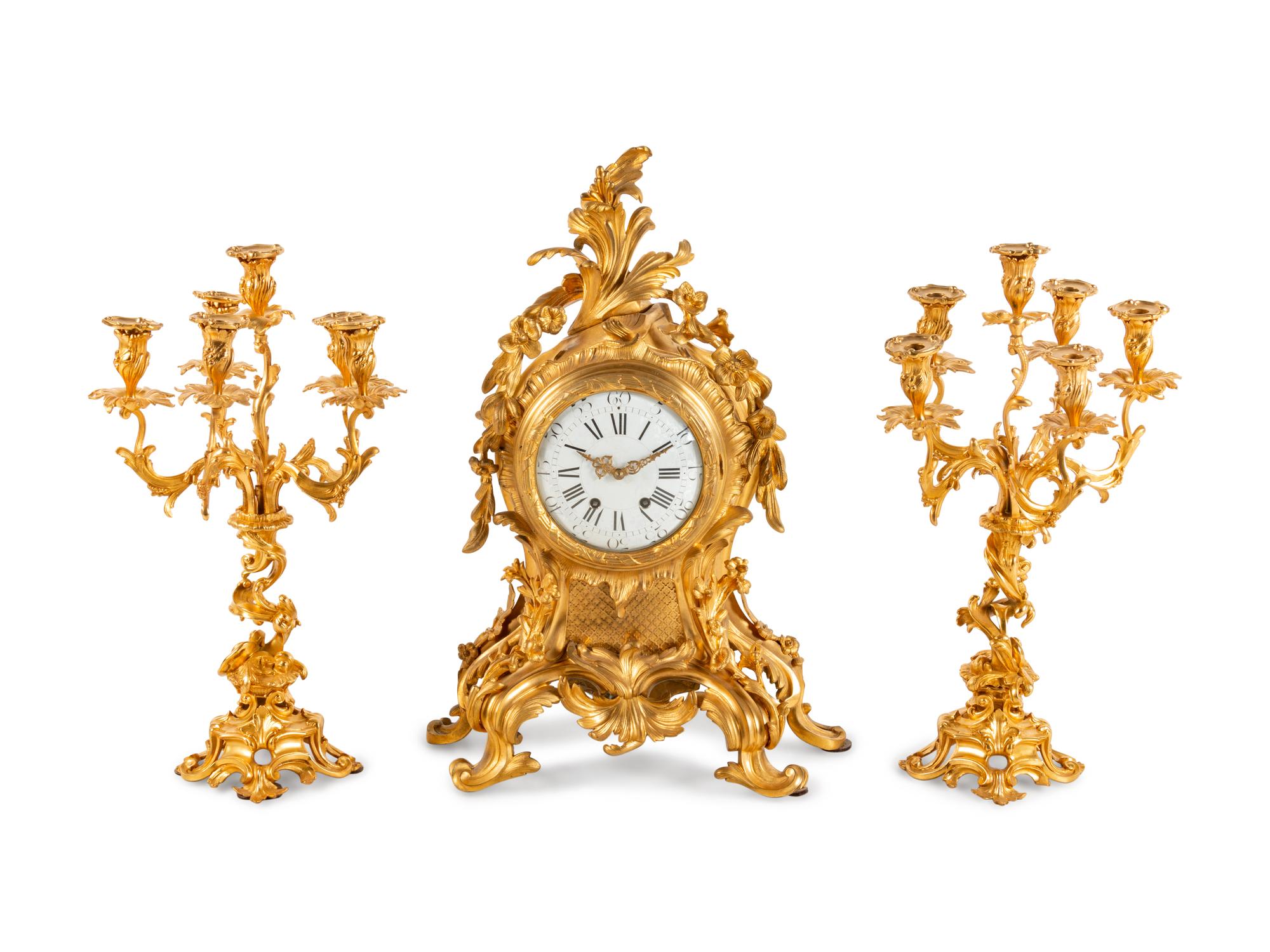 A Louis XV Style Gilt Bronze Clock Garniture