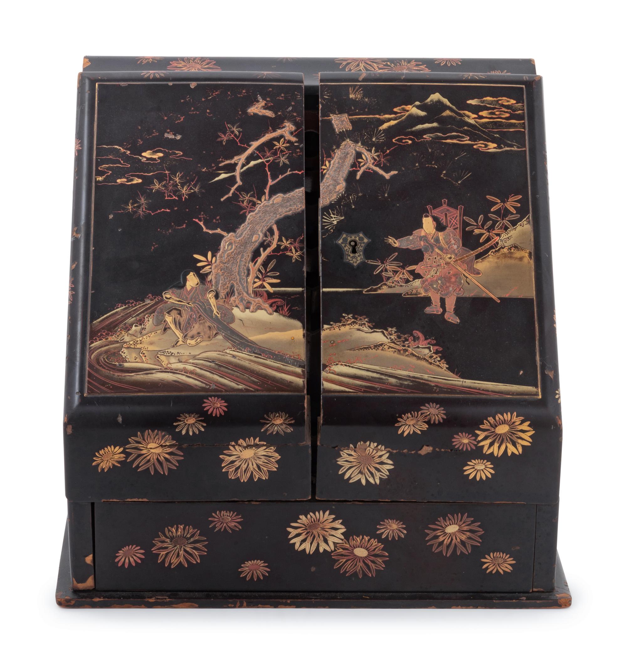 A Japanese Gilt, Black and Red Lacquered Stationary Chest