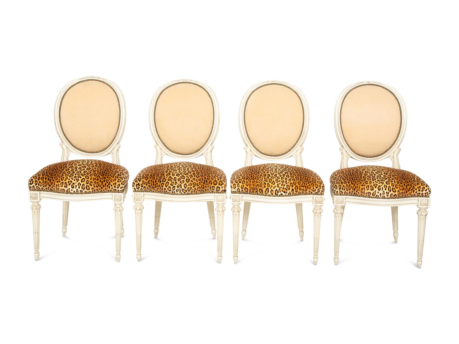 A Set of Eight Louis XVI Style Painted Oval-Back Dining Chairs
