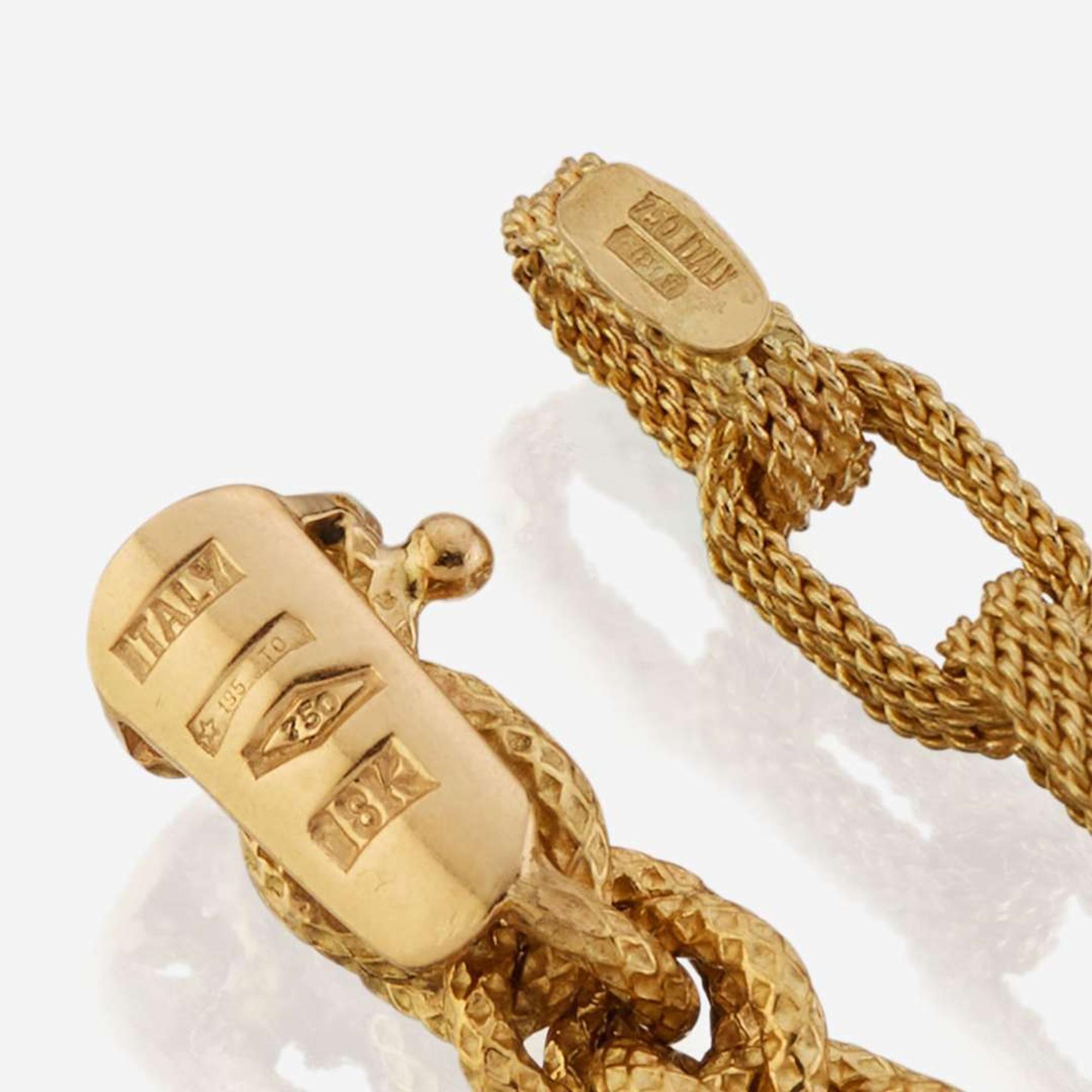 Two pieces of gold jewelry Italy