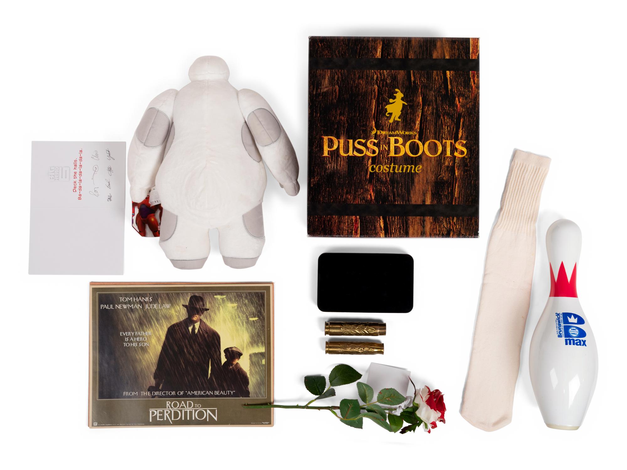 (Film Memorabilia) A group of memorabilia items from 7 films, comprising: