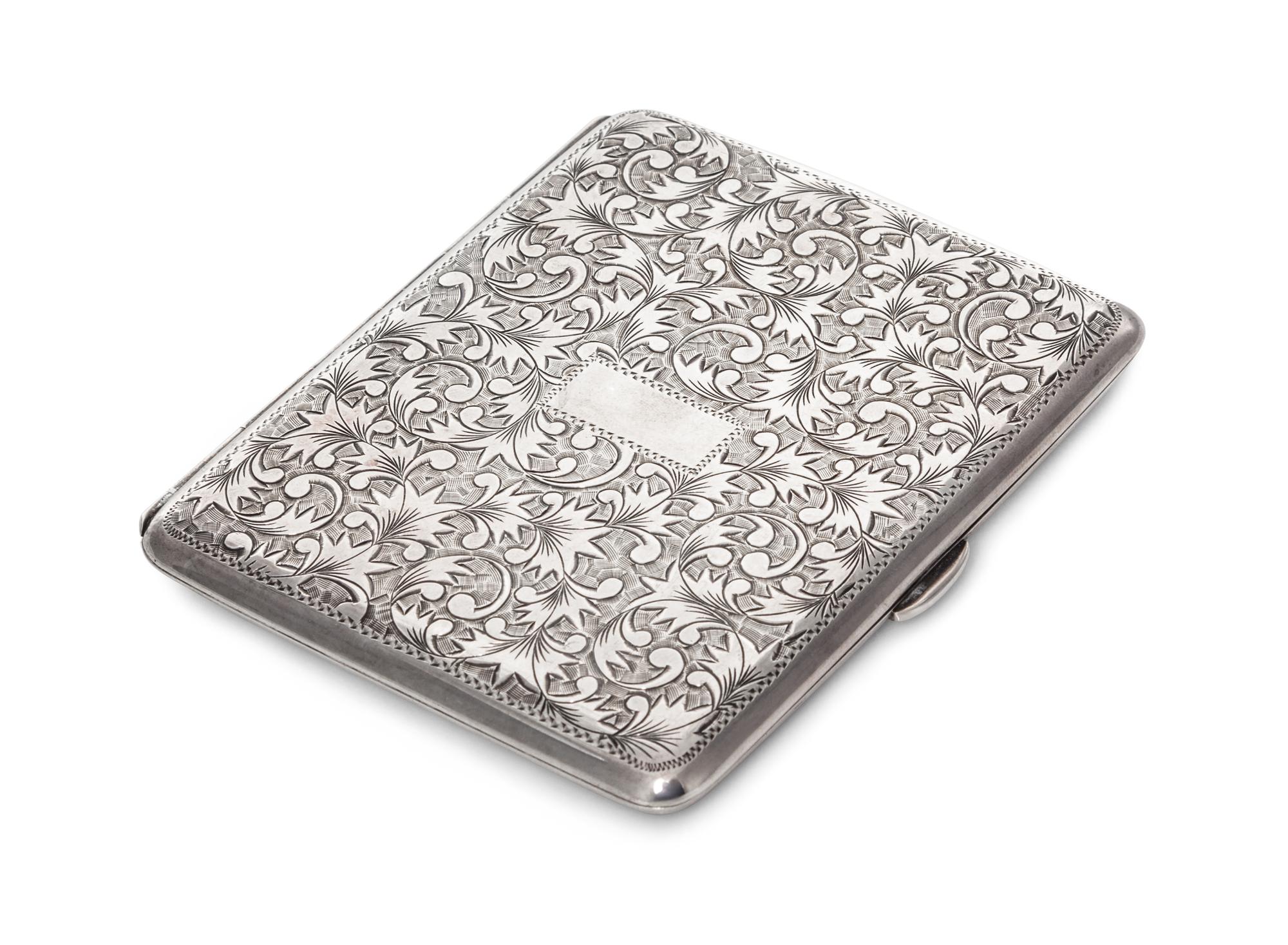 A Silver Cigarette Case, 20th Century, of rectanguar form with allover foliate decoration.