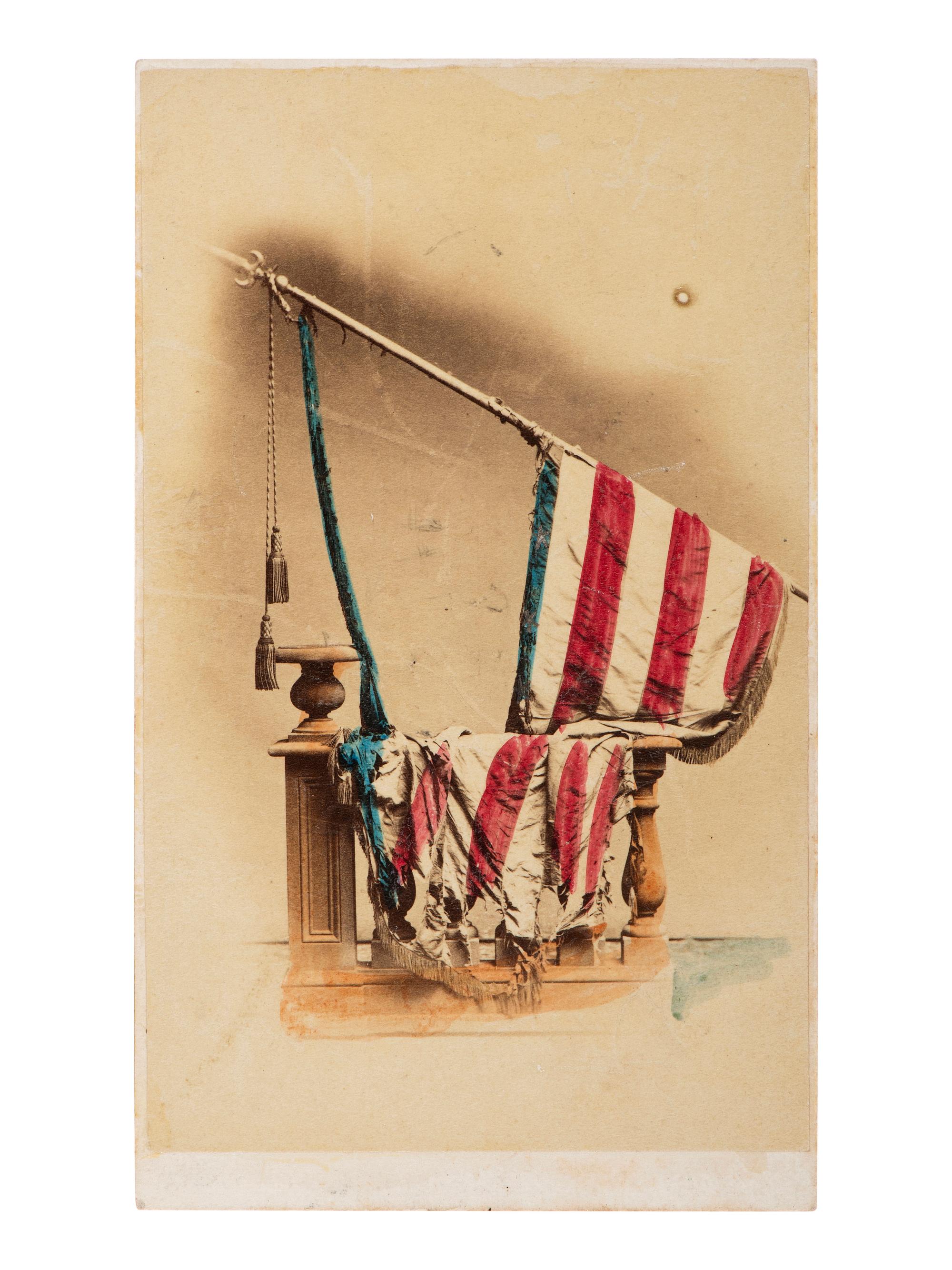[CIVIL WAR]. Hand-colored CDV of the battle-torn National Colors of the 82nd Pennsylvania Infantry.