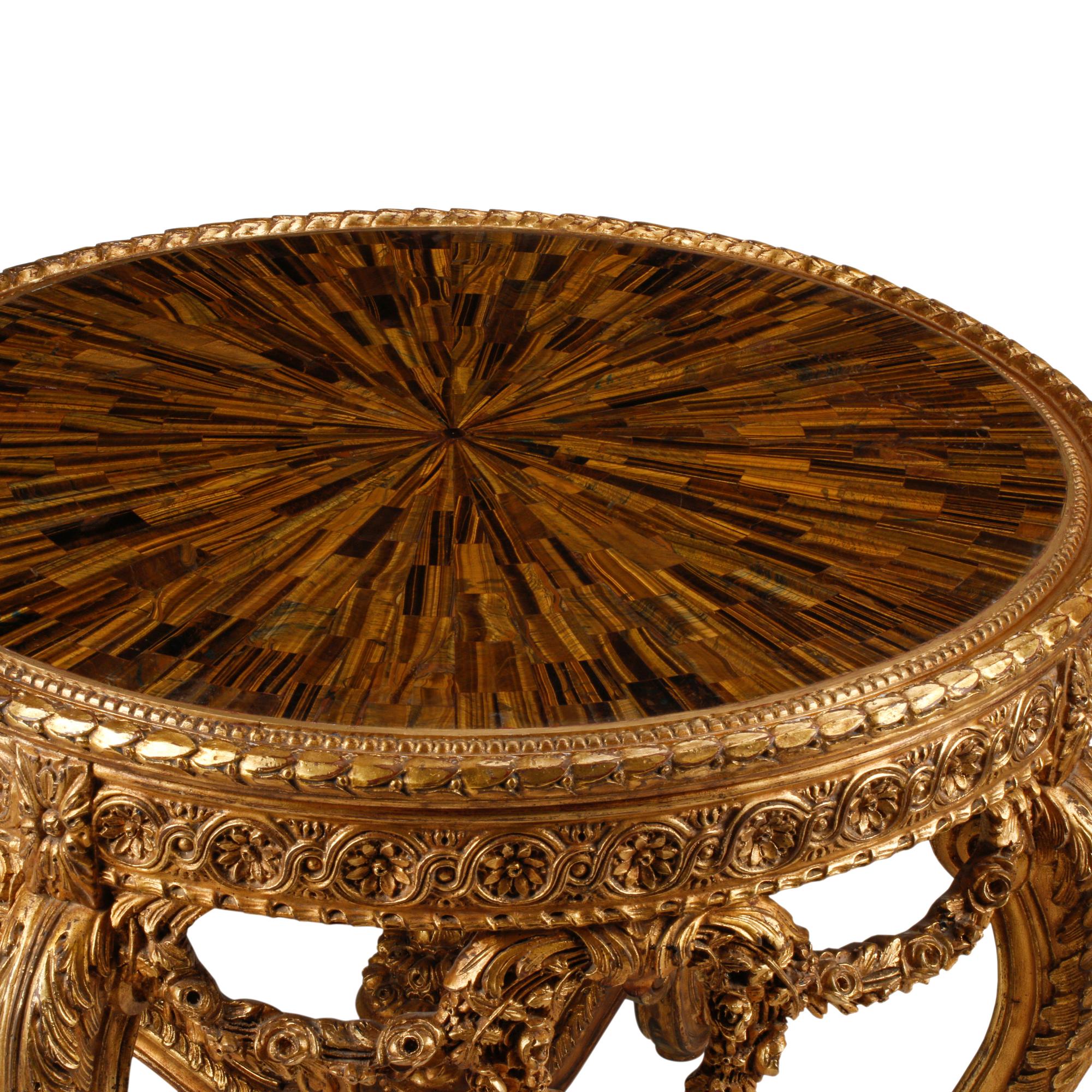 A Louis XVI Style Giltwood and Tiger's Eye Center Table