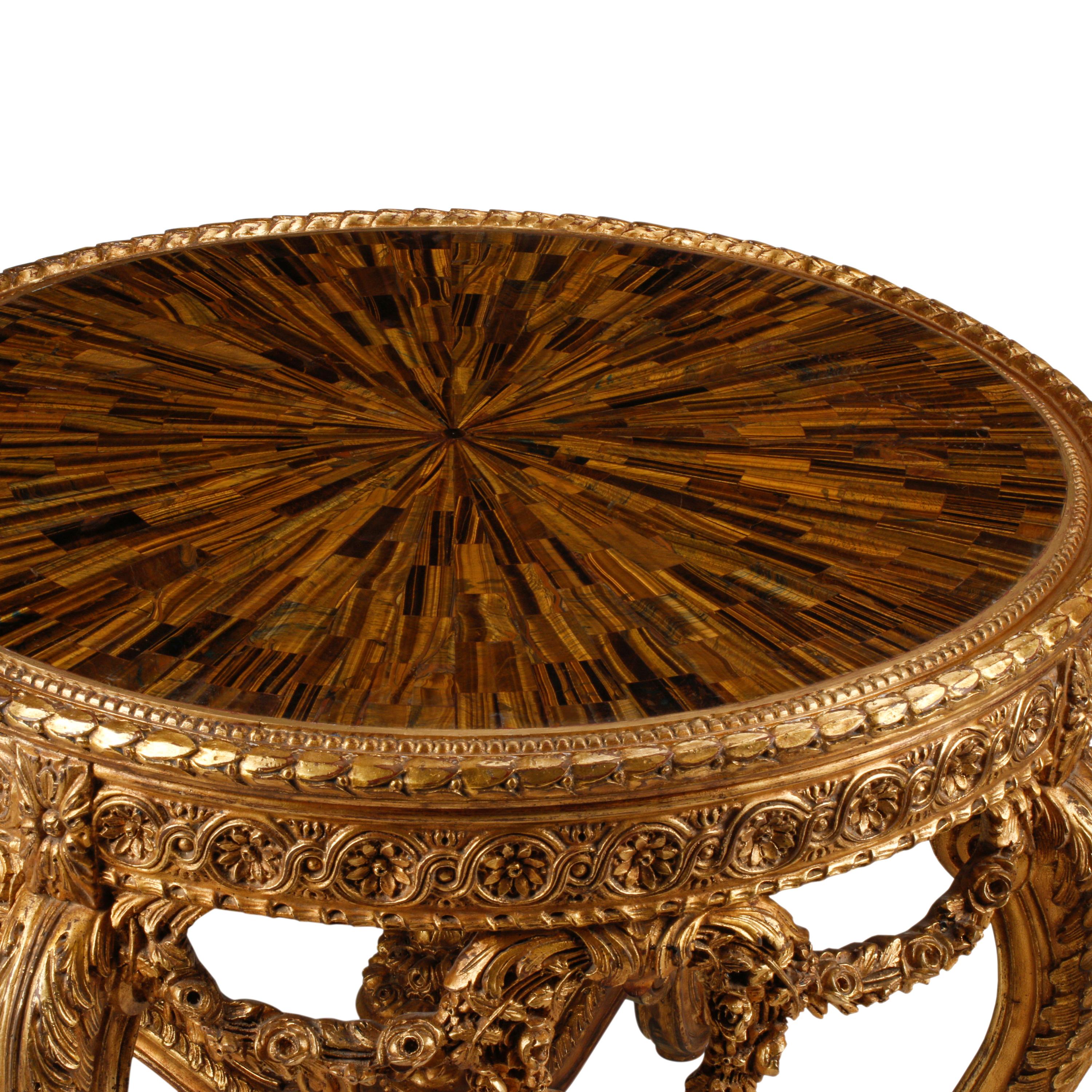 A Louis XVI Style Giltwood and Tiger's Eye Center Table