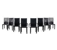 A Set of Eight Contemporary Leather Upholstered Dining Chairs